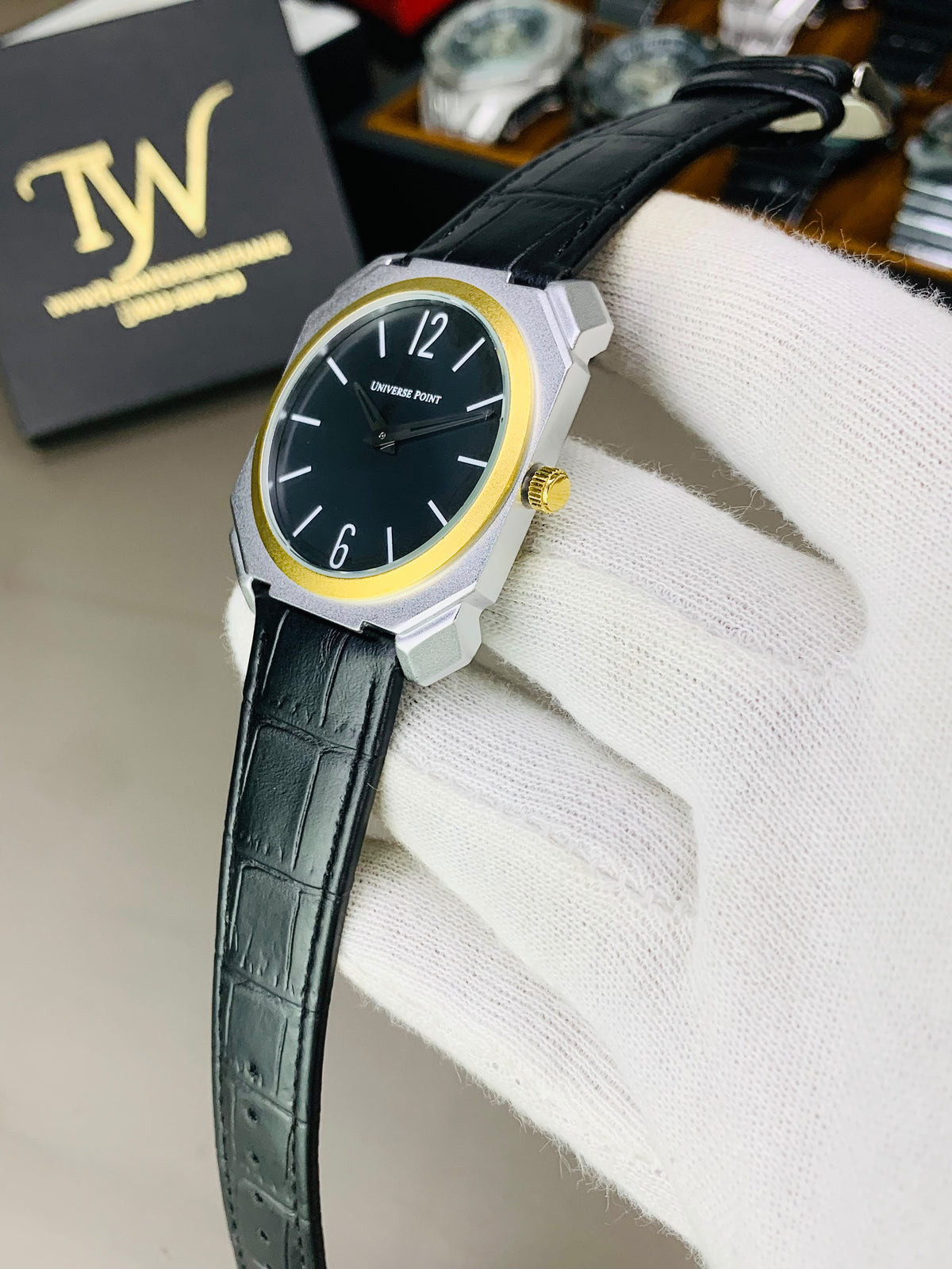 Silver Case Golden Ring Black Strap Watch
